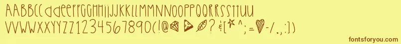 Ultrabeams-Schriftart – Braune Schriften auf gelbem Hintergrund