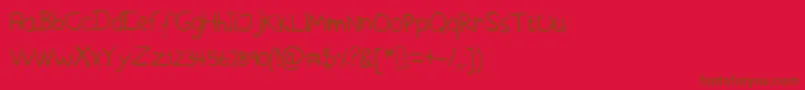 フォントAskeshandwriting – 赤い背景に茶色の文字