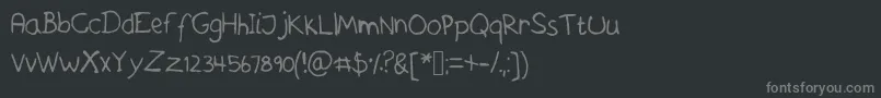 フォントAskeshandwriting – 黒い背景に灰色の文字