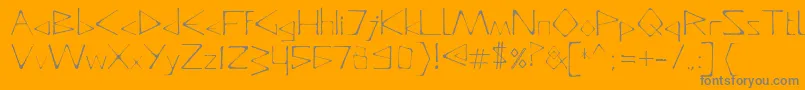 Czcionka DeadlyTypeface – szare czcionki na pomarańczowym tle