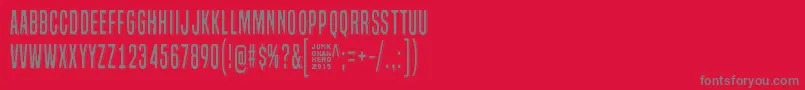 LazyOpossum-Schriftart – Graue Schriften auf rotem Hintergrund
