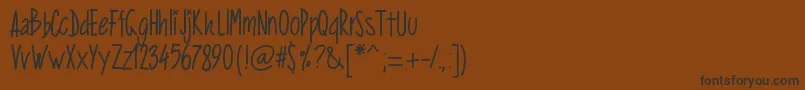 Pwverticalized Font – Black Fonts on Brown Background