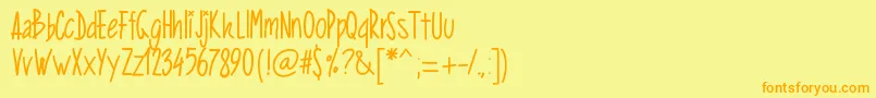 フォントPwverticalized – オレンジの文字が黄色の背景にあります。