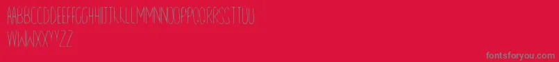 fuente LineAndSand – Fuentes Grises Sobre Fondo Rojo