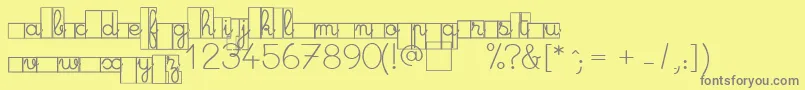 MaternellecolorCase Font – Gray Fonts on Yellow Background