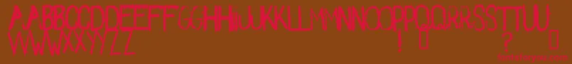 Spikes2 Font – Red Fonts on Brown Background