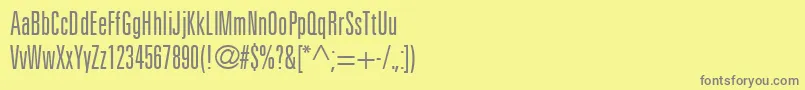 フォントUniversLt49LightUltraCondensed – 黄色の背景に灰色の文字