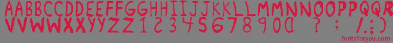 フォントRemnantRegular – 赤い文字の灰色の背景