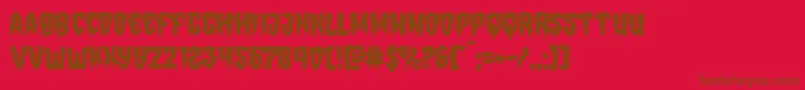 Hemogoblinmangle-Schriftart – Braune Schriften auf rotem Hintergrund