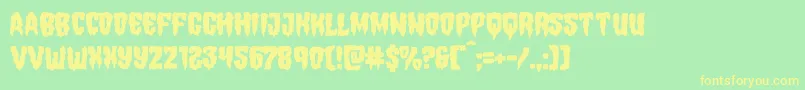 フォントHemogoblinmangle – 黄色の文字が緑の背景にあります