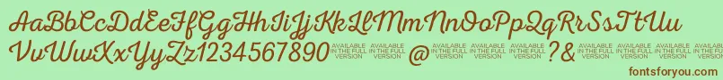 Nexarustscriptl0 Font – Brown Fonts on Green Background