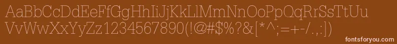 フォントGlyphaltstdThin – 茶色の背景にピンクのフォント