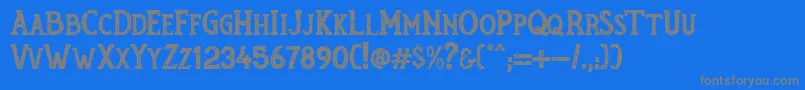 RumouratexturesPersonalUseOnly-fontti – harmaat kirjasimet sinisellä taustalla