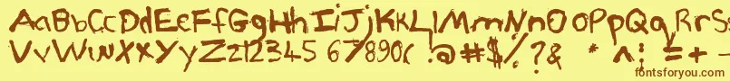 フォントPjgrunge – 茶色の文字が黄色の背景にあります。
