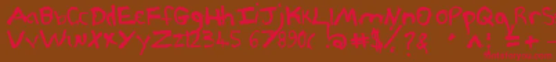 Pjgrunge Font – Red Fonts on Brown Background