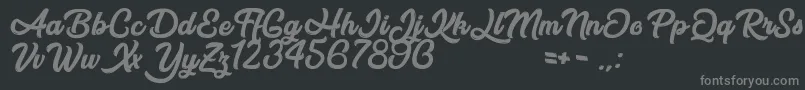 AfterNight-fontti – harmaat kirjasimet mustalla taustalla