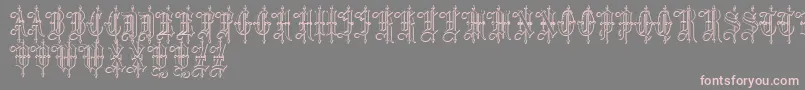LeothricBeveled-Schriftart – Rosa Schriften auf grauem Hintergrund