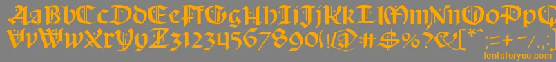 SchampelBlack-Schriftart – Orangefarbene Schriften auf grauem Hintergrund