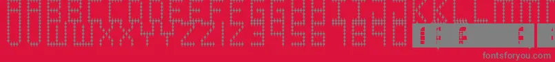 Jokerface Font – Gray Fonts on Red Background