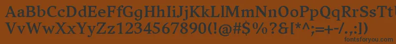 CompatilExquisitLtComBold-fontti – mustat fontit ruskealla taustalla