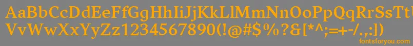 フォントCompatilExquisitLtComBold – オレンジの文字は灰色の背景にあります。