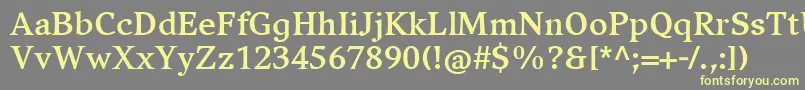 CompatilExquisitLtComBold-fontti – keltaiset fontit harmaalla taustalla