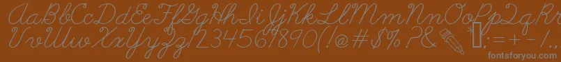 AbcCursive-Schriftart – Graue Schriften auf braunem Hintergrund