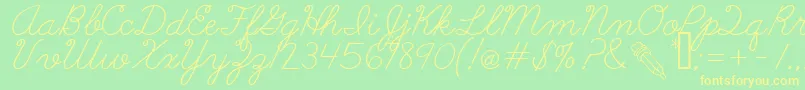 AbcCursive Font – Yellow Fonts on Green Background