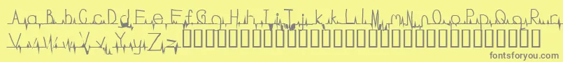 Police Flatline – polices grises sur fond jaune