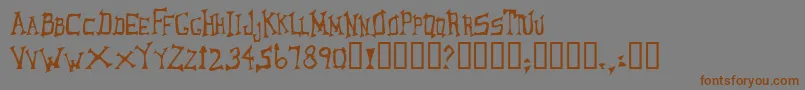LoungerOddtype Font – Brown Fonts on Gray Background