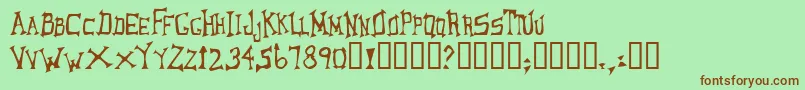 LoungerOddtype Font – Brown Fonts on Green Background