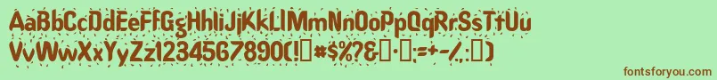 Raindancessk Font – Brown Fonts on Green Background