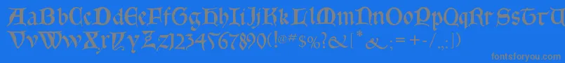 Goticabastard-fontti – harmaat kirjasimet sinisellä taustalla