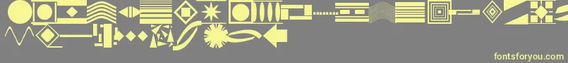 TrinketsJl-fontti – keltaiset fontit harmaalla taustalla