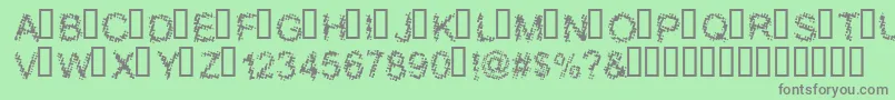 BloodyShrapnel Font – Gray Fonts on Green Background