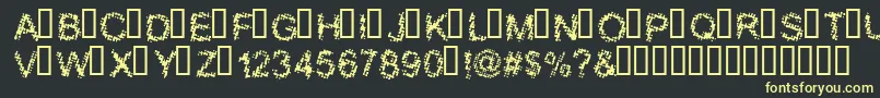 BloodyShrapnel Font – Yellow Fonts on Black Background