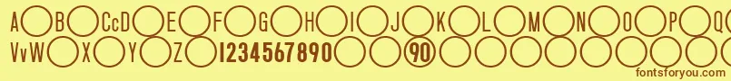 NikeTotal90 Font – Brown Fonts on Yellow Background