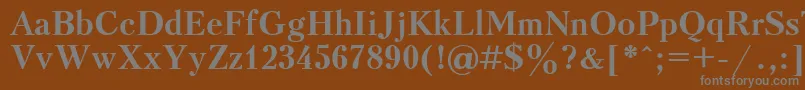 フォントUkrainiankudriashovBold – 茶色の背景に灰色の文字