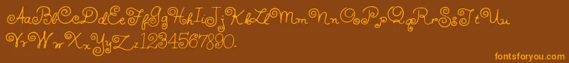 HffWhirlyWhorl Font – Orange Fonts on Brown Background