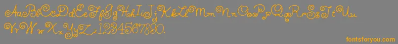 HffWhirlyWhorl-Schriftart – Orangefarbene Schriften auf grauem Hintergrund