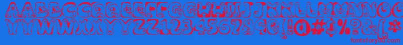 Czcionka Wiggles1 – czerwone czcionki na niebieskim tle