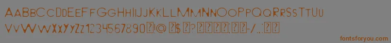 LightFromBehindMilabrya-Schriftart – Braune Schriften auf grauem Hintergrund