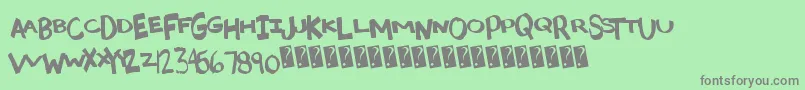 Madcaps Font – Gray Fonts on Green Background