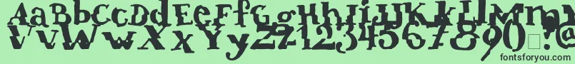 Verrutscht-fontti – mustat fontit vihreällä taustalla