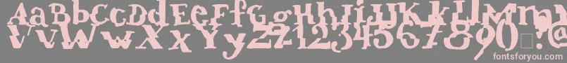 Verrutscht-fontti – vaaleanpunaiset fontit harmaalla taustalla