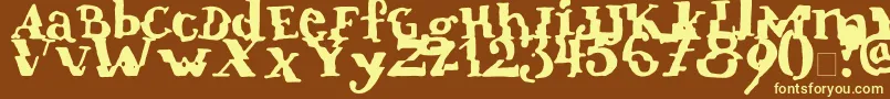 Verrutscht-fontti – keltaiset fontit ruskealla taustalla