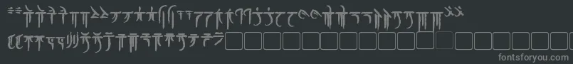 IokharicBold-fontti – harmaat kirjasimet mustalla taustalla