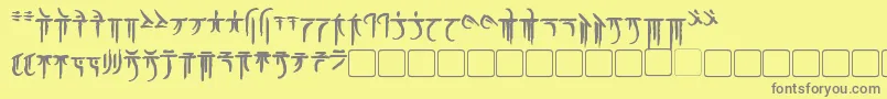 フォントIokharicBold – 黄色の背景に灰色の文字