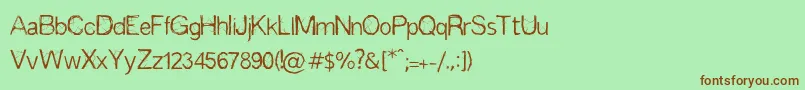 Espinas Font – Brown Fonts on Green Background