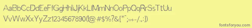 Espinas Font – Gray Fonts on Yellow Background